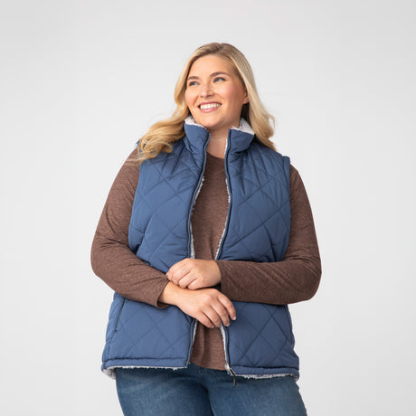 [Lola is 5'10.5" wearing a size 1X.] Women's Plus Size Expedition Stratus Lite Reversible Vest - 1X - Stormy #color_stormy