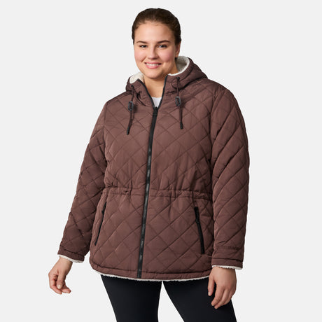 [Karissa is 5’9.5” wearing size 1X.] Women’s quilted brown hooded jacket with diamond pattern, zippered pockets, and drawstring waist — warm, fleece-lined outerwear for cold weather