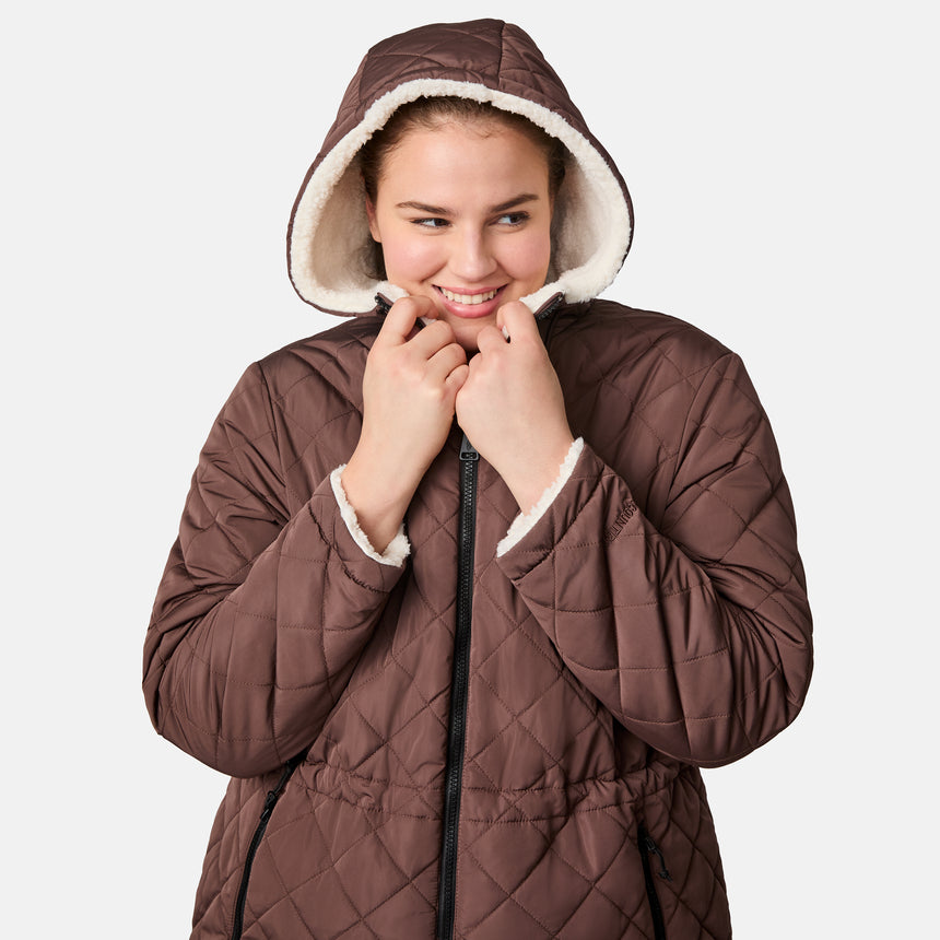 [Karissa is 5’9.5” wearing size 1X.] Women’s quilted brown hooded jacket with diamond pattern, zippered pockets, and drawstring waist — warm, fleece-lined outerwear for cold weather