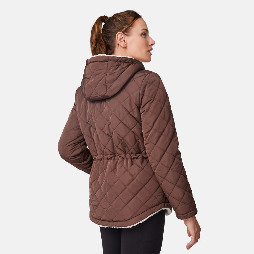 [Emily is 5'9" wearing size S.] Model wearing brown quilted jacket with hood and black pants — reversible design with cream pile interior for cozy, cold-weather layering