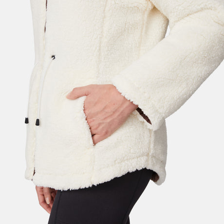 [Emily is 5'9" wearing size S.] Model wearing brown quilted jacket with hood and black pants — reversible design with cream pile interior for cozy, cold-weather layering