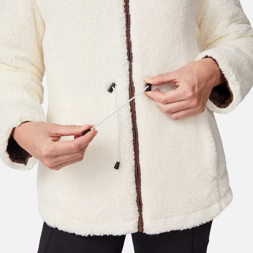 [Emily is 5'9" wearing size S.] Model wearing brown quilted jacket with hood and black pants — reversible design with cream pile interior for cozy, cold-weather layering
