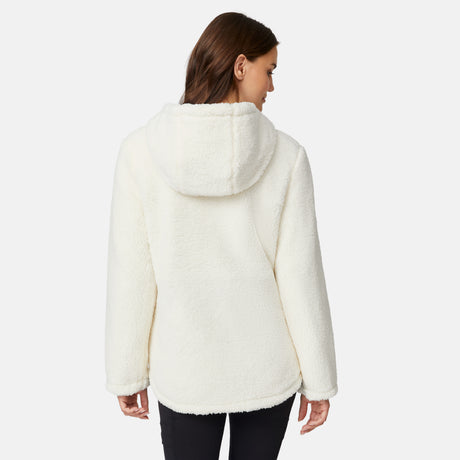 [Jessica is 5'9.5" wearing size S.] Model wearing blue quilted jacket with hood and black pants — reversible design with cream pile interior for cozy, cold-weather layering