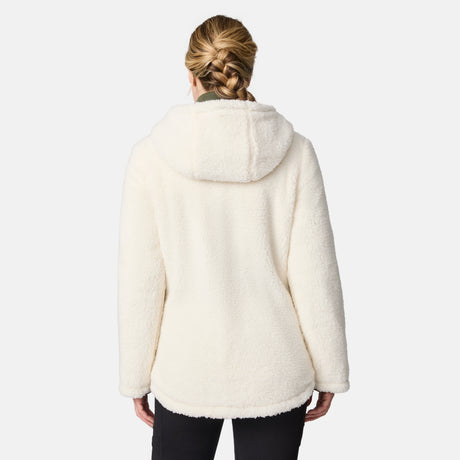 [CJ is 5'10" wearing size S.] Woman wearing Free Country Women's Switch It Up Cloud Lite Reversible Jacket in green with a full front zipper opening, attached hood with adjustable drawcord, diamond quilting, soft lining, and water resistant and wind resistant stretch performance fabric. light grey background. Perfect women’s  jacket for fall weather.