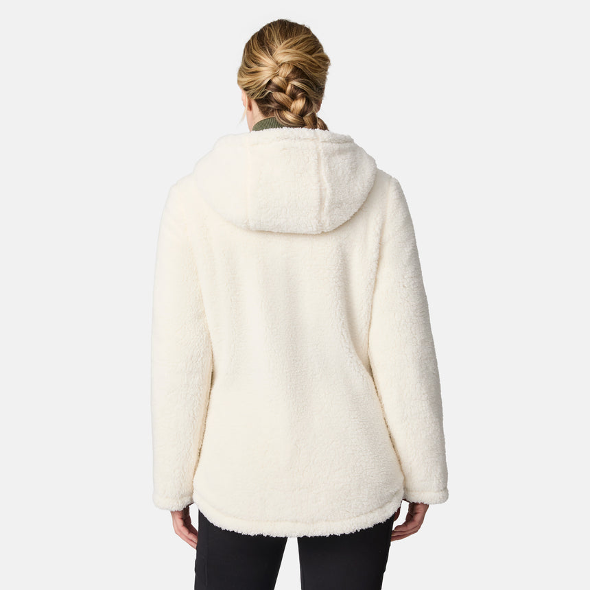 [CJ is 5'10" wearing size S.] Woman wearing Free Country Women's Switch It Up Cloud Lite Reversible Jacket in green with a full front zipper opening, attached hood with adjustable drawcord, diamond quilting, soft lining, and water resistant and wind resistant stretch performance fabric. light grey background. Perfect women’s  jacket for fall weather.