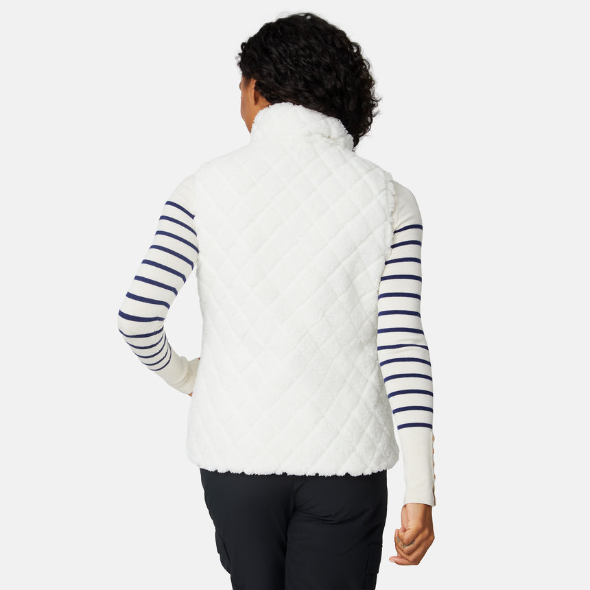 [Angelique is 5'10" wearing size S.] Person wearing a white quilted vest with striped sleeves on a white background
