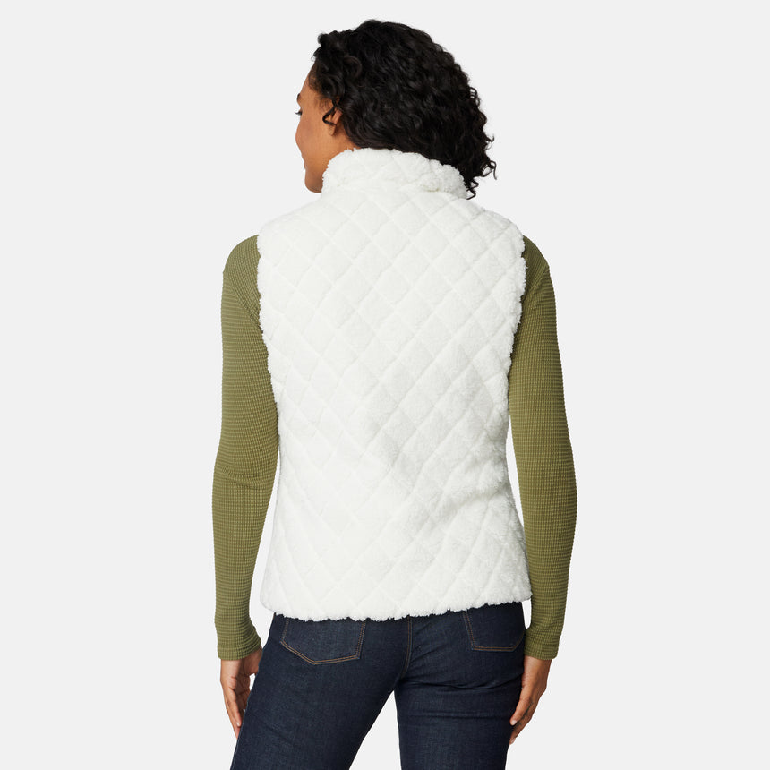 [Angelique is 5'10" wearing size S.] Person wearing a white quilted vest over a green long-sleeve shirt on a white background