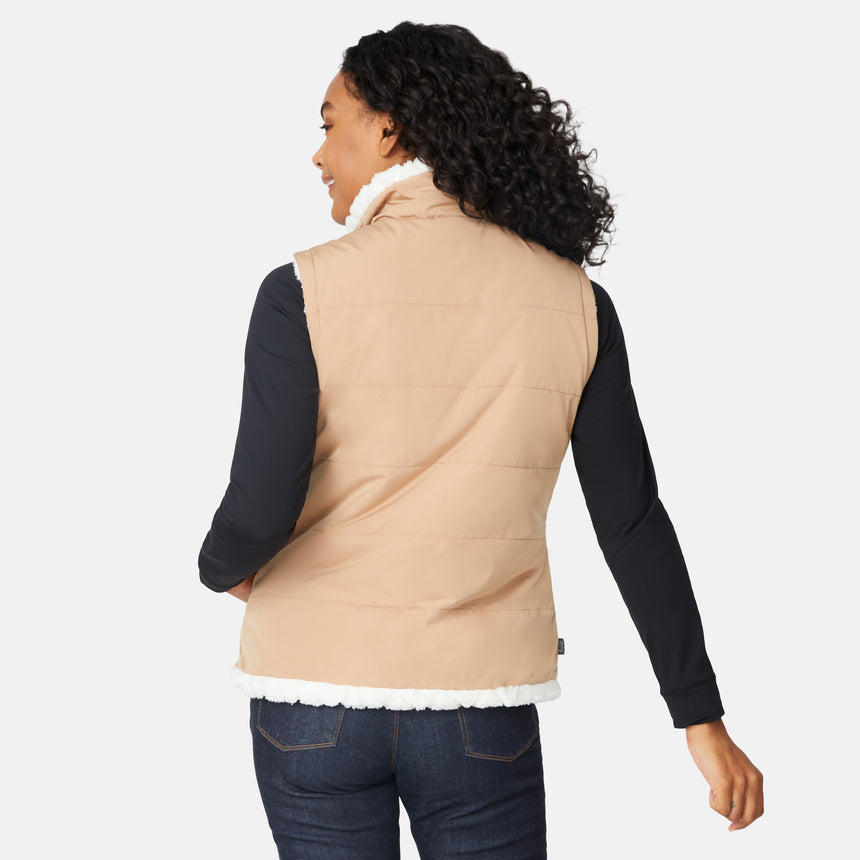 [Angelique is 5'10" wearing size S.] Person wearing a beige vest with white lining on a plain background