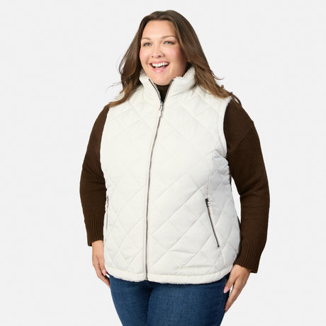 Plus size Stratus Lite II reversible vest white quilted exterior with front zipper over a brown knit sweater