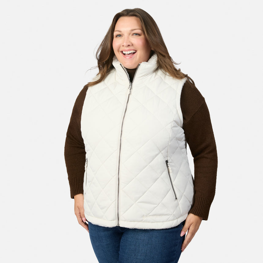 Plus size Stratus Lite II reversible vest white quilted exterior with front zipper over a brown knit sweater