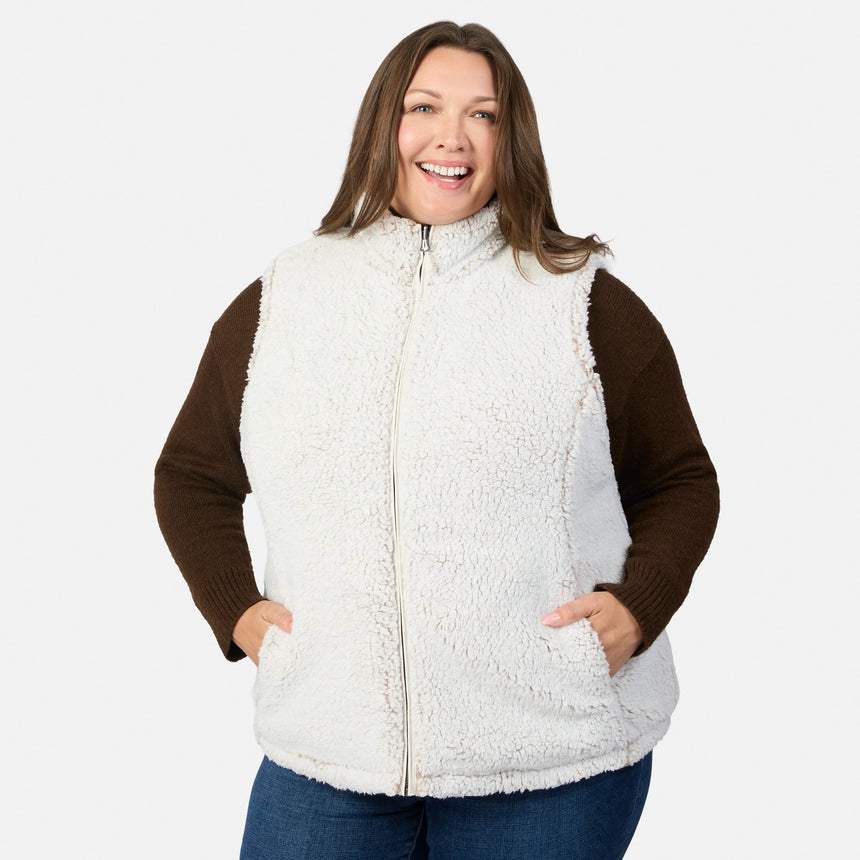 Model wearing Stratus Lite II reversible vest with sherpa interior and zip front