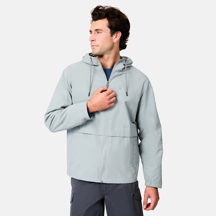 [Jacob is 6’1.5" wearing size M] Man wearing a light gray jacket on a white background