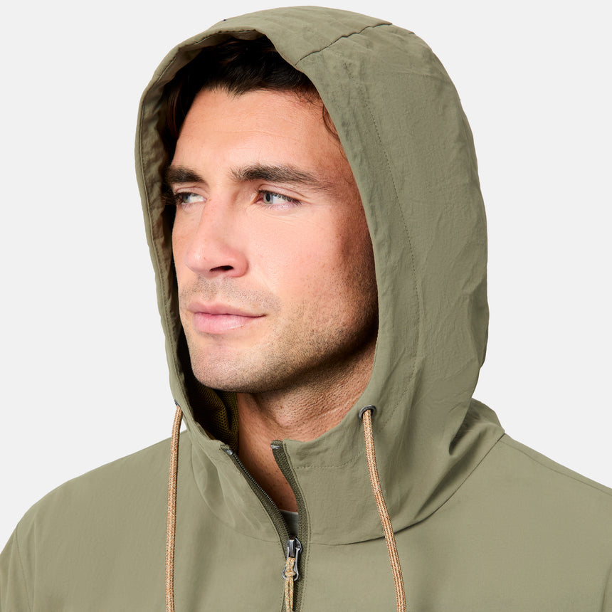 [Jacob is 6’1.5" wearing size M] Man wearing a green hooded jacket on a white background