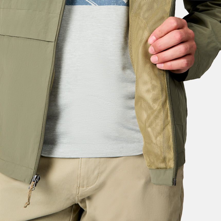 [Jacob is 6’1.5" wearing size M] Close-up of a person wearing a beige jacket with a white shirt underneath on a light gray background