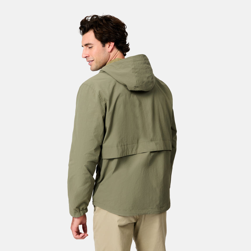 [Jacob is 6’1.5" wearing size M] Man wearing a green jacket on a white background