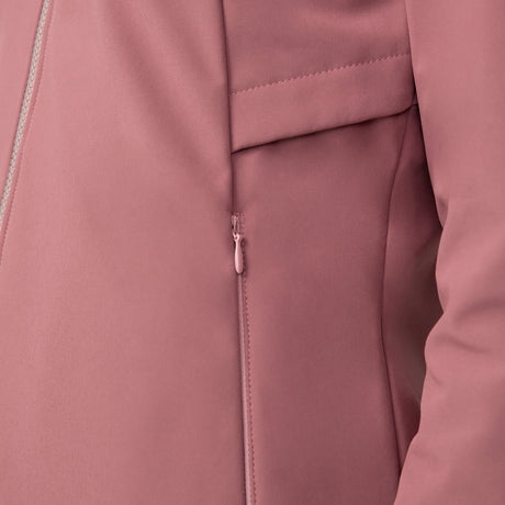 [Olga is 5’9” wearing a size Small.] Woman wearing Free Country Women's Alps Super Softshell® Jacket in pink with a full front zipper opening, soft lining, attached hood with adjustable drawcords, and water resistant and wind resistant stretch performance fabric, light grey background. Perfect women’s  jacket for fall weather.