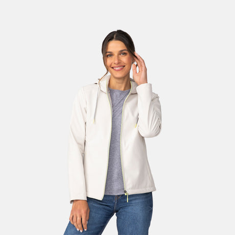 [Olga is 5’9” wearing a size Small.] Woman wearing Free Country Women's Alps Super Softshell® Jacket in white with a full front zipper opening, soft lining, attached hood with adjustable drawcords, and water resistant and wind resistant stretch performance fabric, light grey background. Perfect women’s  jacket for fall weather.