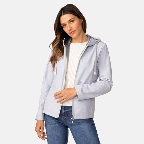 [Olga is 5’9” wearing a size Small.] Woman wearing Free Country Women's Alps Super Softshell® Jacket in textured ligth grey with a full front zipper opening, soft lining, attached hood with adjustable drawcords, and water resistant and wind resistant stretch performance fabric, light grey background. Perfect women’s  jacket for fall weather.