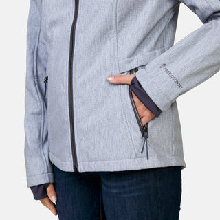 [Megan is 5’6” wearing a size Small.] Woman wearing Free Country Women's Aeris II Super Softshell® Jacket in textured grey with a full front zipper opening, soft lining, detachable hood, and water resistant and wind resistant stretch performance fabric, light grey background. Perfect women’s  jacket for fall weather.