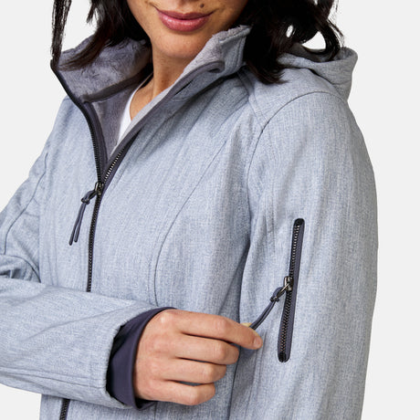 [Megan is 5’6” wearing a size Small.] Woman wearing Free Country Women's Aeris II Super Softshell® Jacket in textured grey with a full front zipper opening, soft lining, detachable hood, and water resistant and wind resistant stretch performance fabric, light grey background. Perfect women’s  jacket for fall weather.