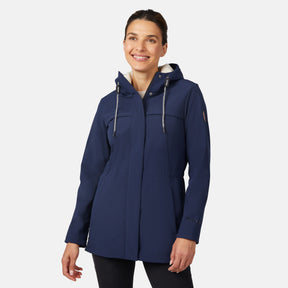 [Jessica is 5'9.5" wearing size S.] Free Country navy blue women’s softshell jacket with a fitted silhouette, zip-front closure, long sleeves, and adjustable hood drawstrings—styled with black pants for a sleek, minimalist outdoor look.