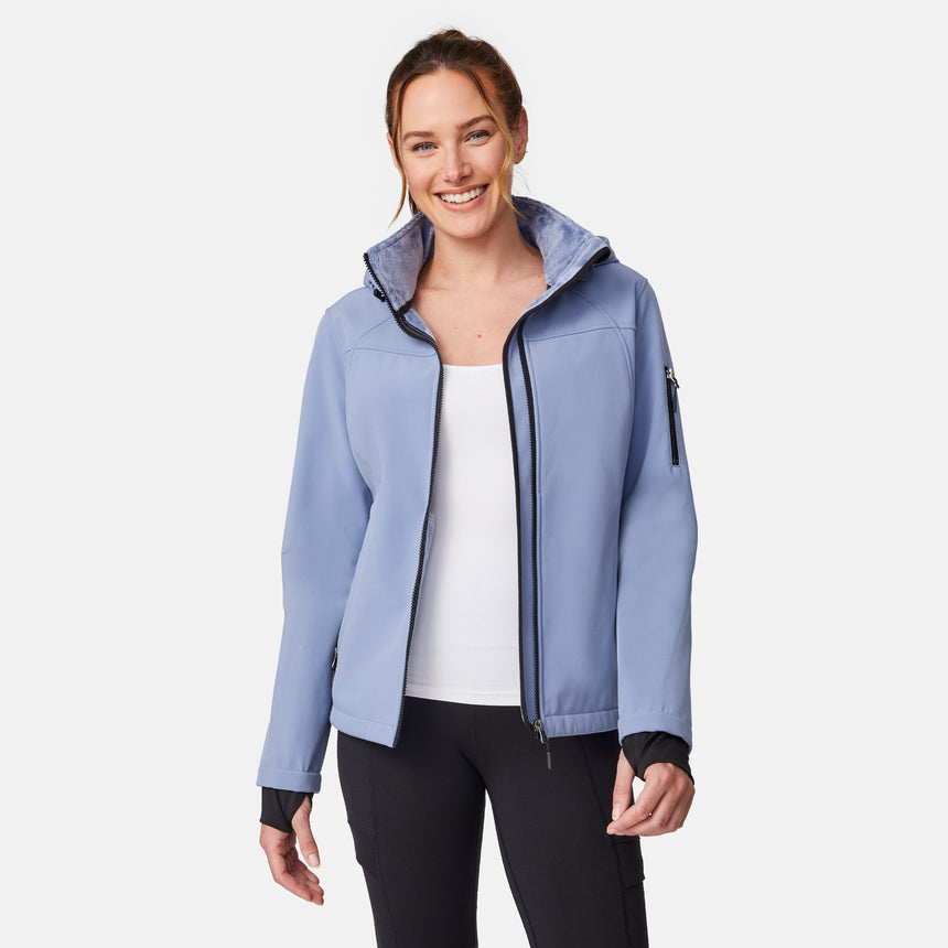 [Emily is 5'9" wearing size S.] Women’s light blue softshell hooded jacket with black zippers, sleeve pocket, and front zip closure — lightweight, weather-resistant layer for active wear