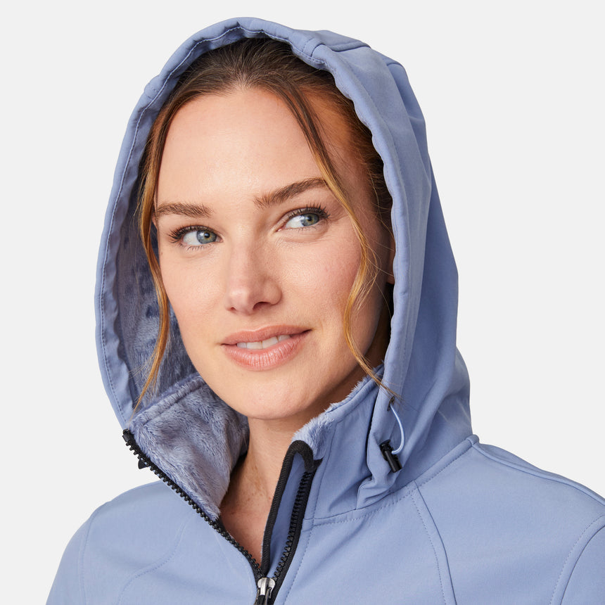 [Emily is 5'9" wearing size S.] Women’s light blue softshell hooded jacket with black zippers, sleeve pocket, and front zip closure — lightweight, weather-resistant layer for active wear