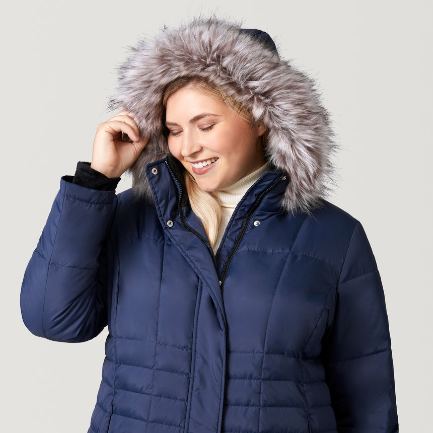 [Lola is 5'10.5" wearing a size 1X.] Women's Plus Size Full Length Splendor Down Jacket - Indigo - 1X #color_indigo