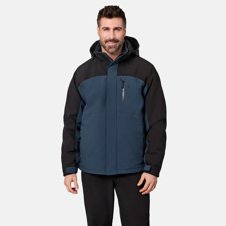 [Model is wearing size M.] A man wearing a two-tone hooded jacket in navy blue and black, paired with black pants, standing against a light gray studio background.