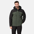 [Model is wearing size M.] A man wearing a hooded outdoor jacket in dark green and black, paired with black pants, photographed against a light gray studio background.