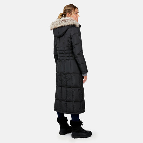 [Brooke is 5'9" wearing a size Small.] Woman wearing Free Country Women's Full Length Splendor Down Jacket in black with a full front zipper opening, lower pockets, calf length, a detachable hood with faux fur trim, and water resistant and wind resistant stretch performance fabric, light grey background. Best women’s jacket for winter weather.