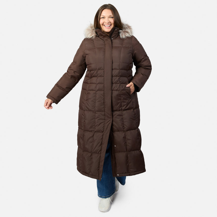 Front view of smiling model wearing burgundy plus size Splendor down jacket with fur hood