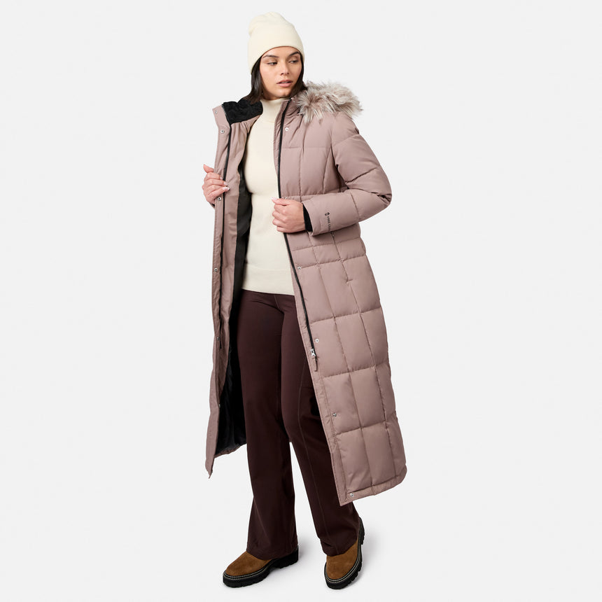 Model in the dusty rose Splendor Down Jacket with fur hood, brown pants and tan boots visible