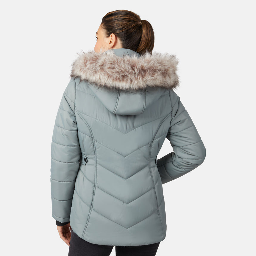 [Olga is 5'9" wearing size S.] Model wearing green quilted jacket with faux fur hood and attached bib — layered warmth and stylish silhouette for winter outings