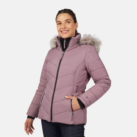 [Olga is 5'9" wearing size S.] Model wearing pink quilted jacket with faux fur hood and attached bib — layered warmth and stylish silhouette for winter outings