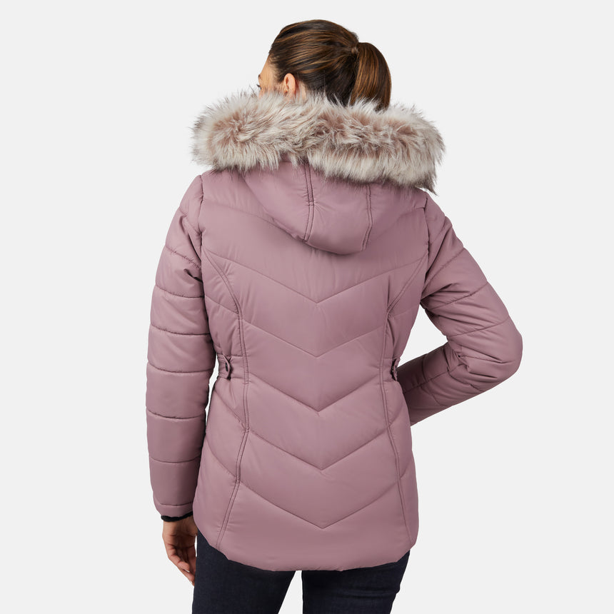 [Olga is 5'9" wearing size S.] Model wearing pink quilted jacket with faux fur hood and attached bib — layered warmth and stylish silhouette for winter outings