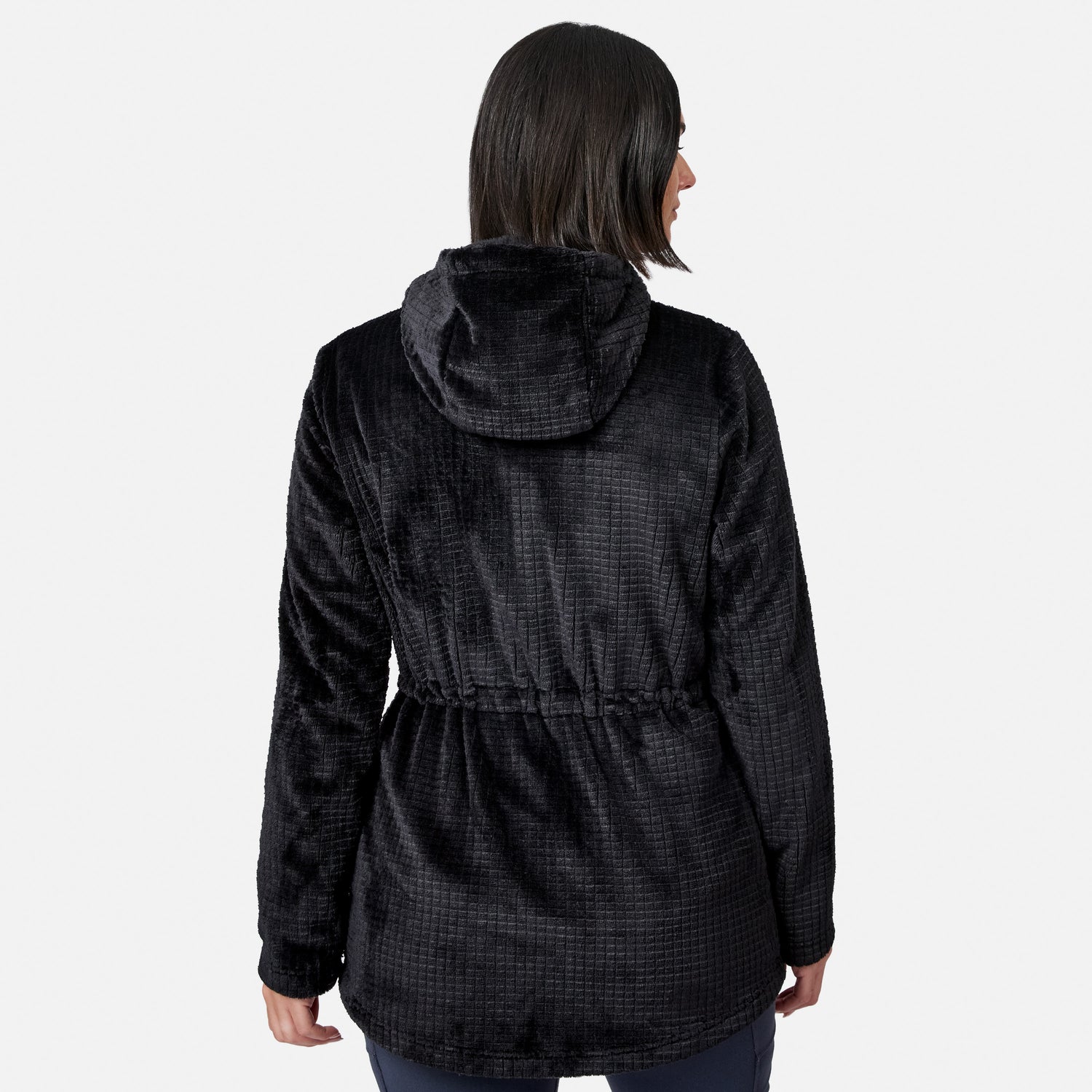 A person with shoulder-length dark hair is seen from the back wearing the Free Country Women’s Grid Butter Pile® Anorak Jacket, photographed against a plain white background.