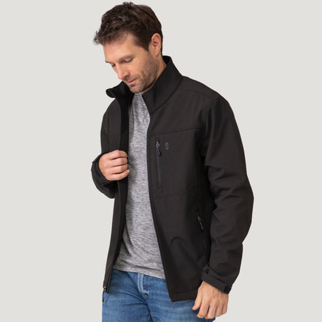 Male model wearing black Hanson II Super Softshell Jacket facing forward with zipper closure and stand collar.