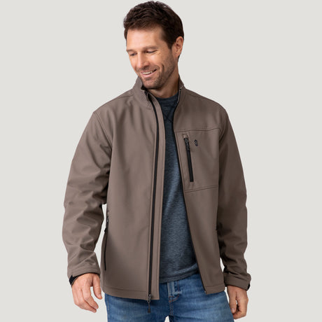 Rear view of male model wearing Men's Hanson II Super Softshell Jacket in taupe, standing collar seen from behind.