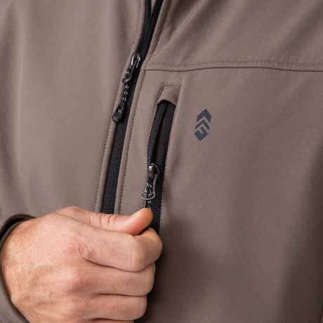 Close up of front zipper and pocket on Men's Hanson II Super Softshell Jacket in taupe