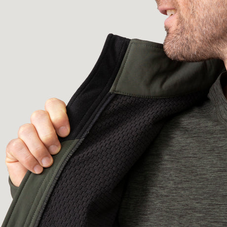 Close-up of the Men's Hanson II Super Softshell jacket collar in black and olive fabric, held by fingers.