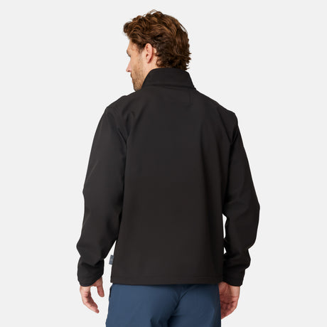 [Matt is 6'2" wearing size M.] Men’s Free Country black zip-front softshell jacket with high stand collar, subtle chest logo, and minimalistic design—featuring streamlined silhouette and long sleeves. Worn with blue pants for a clean, versatile look suited to cool-weather outings.