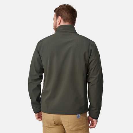 [Joe is 6'0" wearing size M.] Men’s Free Country olive green zip-front softshell jacket with high stand collar, subtle chest logo, and minimalistic design—featuring streamlined silhouette and long sleeves. Worn with blue pants for a clean, versatile look suited to cool-weather outings.