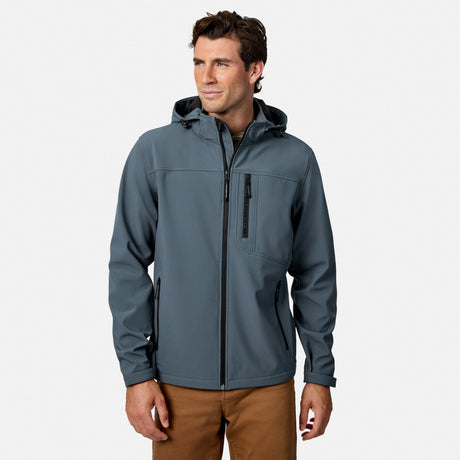 [Model is wearing size M.] A man wearing a slate blue-gray hooded zip-up jacket with a vertical chest pocket, paired with brown pants, photographed against a clean light gray studio background.