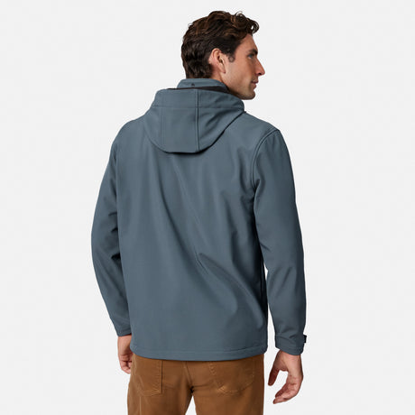 [Model is wearing size M.] A man wearing a slate blue hooded jacket, shown from the back and side profile against a light gray studio background.