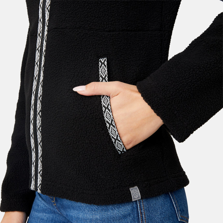 [Jessica is 5'9.5" wearing size S.] Woman wearing a black jacket with decorative zipper details on a white background