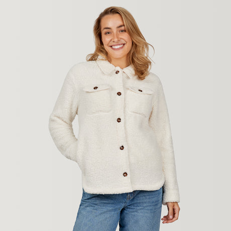 [Chelsea is 5'11.5" wearing a size Small.] Woman wearing Free Country Women's Sherpa Shacket in white with a full front button opening, stand collar, chest pockets, and soft sherpa fabric. light grey background. Perfect women’s jacket for fall weather.