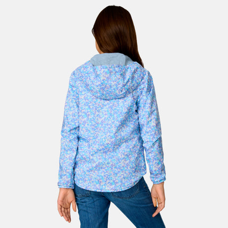 A person with long brown hair, seen from the back, wears a Clearance Girls' High Stretch Windshear Jacket and blue jeans against a plain white background.