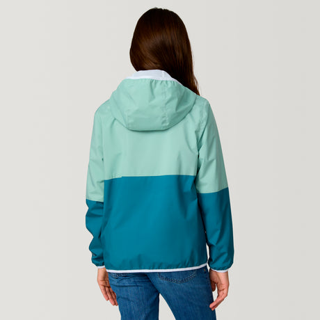 [Model is wearing a size Medium.] Girl wearing the Free Country Girls' Easy Hiking Windshear Jacket in Green Tea, size M, featuring two tones color made from recycled polyester fabric that provides four way stretch and water and wind resistance, layered over a pink t shirt with blue jeans #color_ Green-Tea