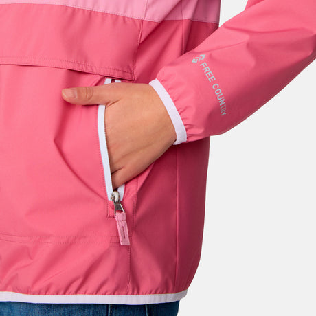 [Model is wearing a size Medium.] Girl wearing the Free Country Girls' Easy Hiking Windshear Jacket in Rose Petal, size M, featuring two tones color made from recycled polyester fabric that provides four way stretch and water and wind resistance, layered over a white t shirt with blue jeans #color_ Rose-Petal